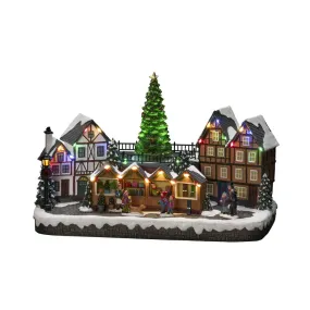 Mechanische Kerstdecoratie Met Kerstmarkt 24cm Veelkleurig Van Konstsmide - Met 28 warmwitte LED-lampjes, met sneeuw bedekte huizen, kleurrijke marktkraampjes en een statige kerstboom in het midden verspreidt het zowel licht als muziek.