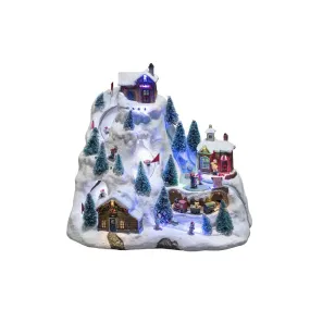 Mechanische Kerstdecoratie Met Berglandschap 28cm Veelkleurig Van Konstsmide - Het besneeuwde berglandschap licht op met prachtige LED-lampjes, bewegende details en speelt 8 klassieke kerstliedjes.