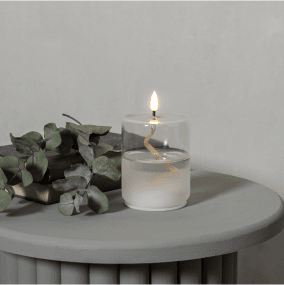 Lantaarn Flamme Float Transparant Van Star Trading - Flamme Float is een kaars met een glazen houder met daarin transparante was.