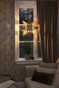 Papieren Ster Ø50 Bruin Van Konstsmide - Een stijlvolle combinatie van traditioneel vakmanschap en moderne vormgeving die de winterse duisternis opfleurt met warmte en karakter.