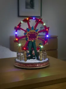 Mechanische Kerstdecoratie Met Reuzenrad 30cm Veelkleurig Van Konstsmide - Cre&euml;er een magisch kerstgevoel met deze charmante mechanische kerstversiering in de vorm van een reuzenrad.