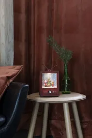 Met Water Gevulde Lantaarn In De Vorm Van Een Tv Bruin Van Konstsmide - Deze met water gevulde lantaarn in de vorm van een retro-tv toont een sfeervol tafereel met de Kerstman, een jongen en een versierde kerstboom.