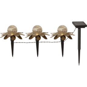 Lilly 3 Stuks Goud solarlamp Van Star Trading - De decoraties hebben een diameter van ongeveer 15 cm en een hoogte van 10 cm, met een tussenruimte van 65 cm tussen elke lamp en een totale lengte van ongeveer 130 cm.