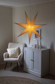 Papieren ster Ø78 Beige Van Konstsmide - Met zijn zeven punten en een royale diameter van 78 cm is het een prachtige blikvanger voor het raam of als hanglamp in de kamer.