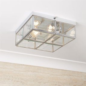 Pisa 25cm Chroom plafondlamp Van Searchlight - De vierkante panelen van gepolijst chroom en helder glas cre&euml;ren een spannend lichtspel en een interessant design dat de aandacht trekt zonder de kamer over te nemen.