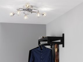 Excel Ø75 Chroom plafondlamp Van Cottex - Het open, gaasachtige ontwerp van de lampenkappen creëert een fascinerend lichtspel wanneer de lamp brandt, waardoor de kamer een uniek karakter krijgt.