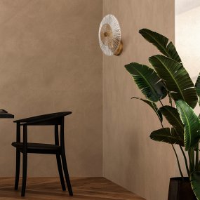 Aster Ø28 Goud wandlamp Van Maytoni - Met zijn ingewikkeld ontworpen glazen kap met een stralend patroon en een elegante gouden voet verspreidt hij een prachtig en reflecterend lichtspel in de kamer.