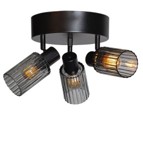 Kiera 3 Zwart/Rookkleurig spot Van Cottex - Het getinte glas geeft de lamp een elegante uitstraling en cre&euml;ert een sfeervol licht met een prachtig spel van licht door de geribbelde structuur.