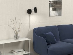 Holder Ø6 Zwart wandlamp Van Herstal - De structuur van de materialen zorgt ervoor dat de lamp tot leven komt.