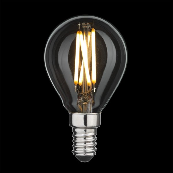 LED E14 bollamp 4W 2700K Transparant Van Unison - Met 4W vermogen en een zacht, warm licht; Met een lichtopbrengst van 2700K is deze lamp energiezuinig en ideaal voor het cre&euml;ren van een aangename sfeer in kleinere lampen of decoratieve installaties.