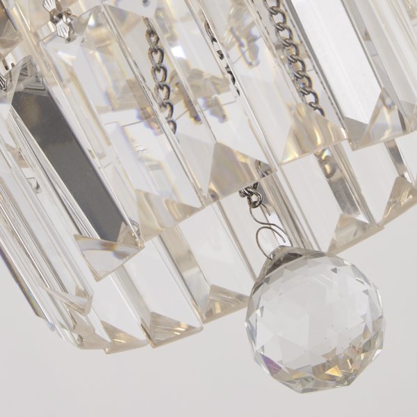Empire Ø50 Chroom badkamerlamp Van Searchlight - Het elegante design van de lamp en het prachtige lichtspel creëren een luxueuze sfeer die uw kamer direct transformeert.