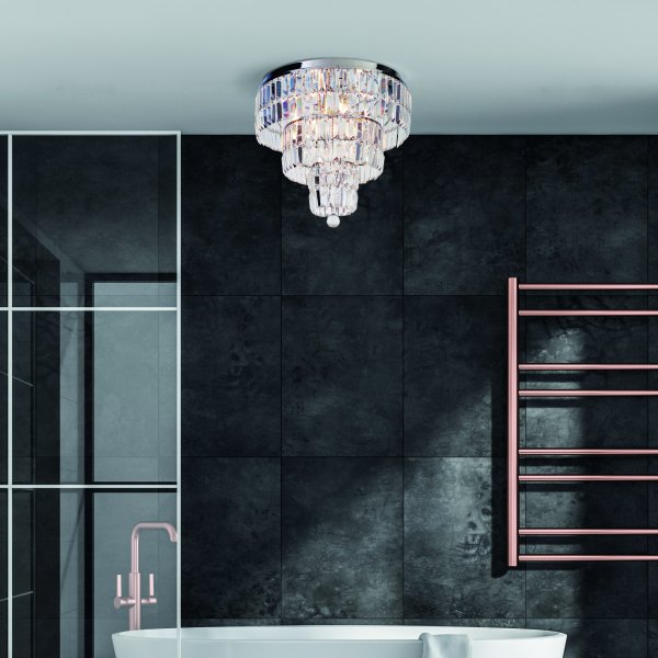 Empire Ø50 Chroom badkamerlamp Van Searchlight - Het elegante design van de lamp en het prachtige lichtspel creëren een luxueuze sfeer die uw kamer direct transformeert.