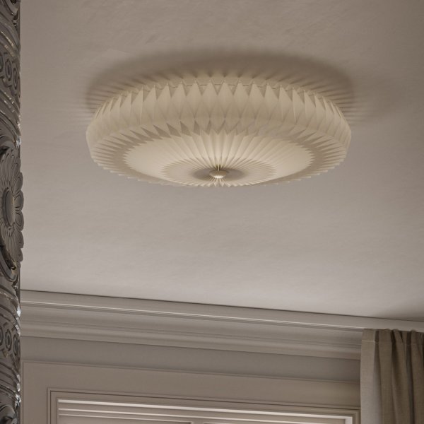  Pompom Ø57 Wit plafondlamp Van CO Bankeryd - De lamp geeft een zacht, algemeen licht of een diffuse, sfeervolle gloed wanneer hij gedimd wordt.