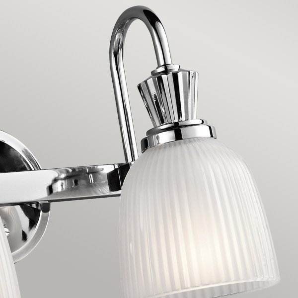 Cora 40cm Gepolijst chroom badkamerlamp Van Elstead Lighting - Deze collectie maakt gebruik van LED-verlichting en heeft elegante rondingen en strakke lijnen die een modern tintje aan de uitstraling toevoegen.