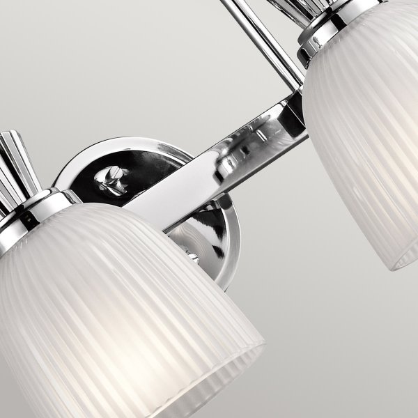 Cora 40cm Gepolijst chroom badkamerlamp Van Elstead Lighting - Deze collectie maakt gebruik van LED-verlichting en heeft elegante rondingen en strakke lijnen die een modern tintje aan de uitstraling toevoegen.