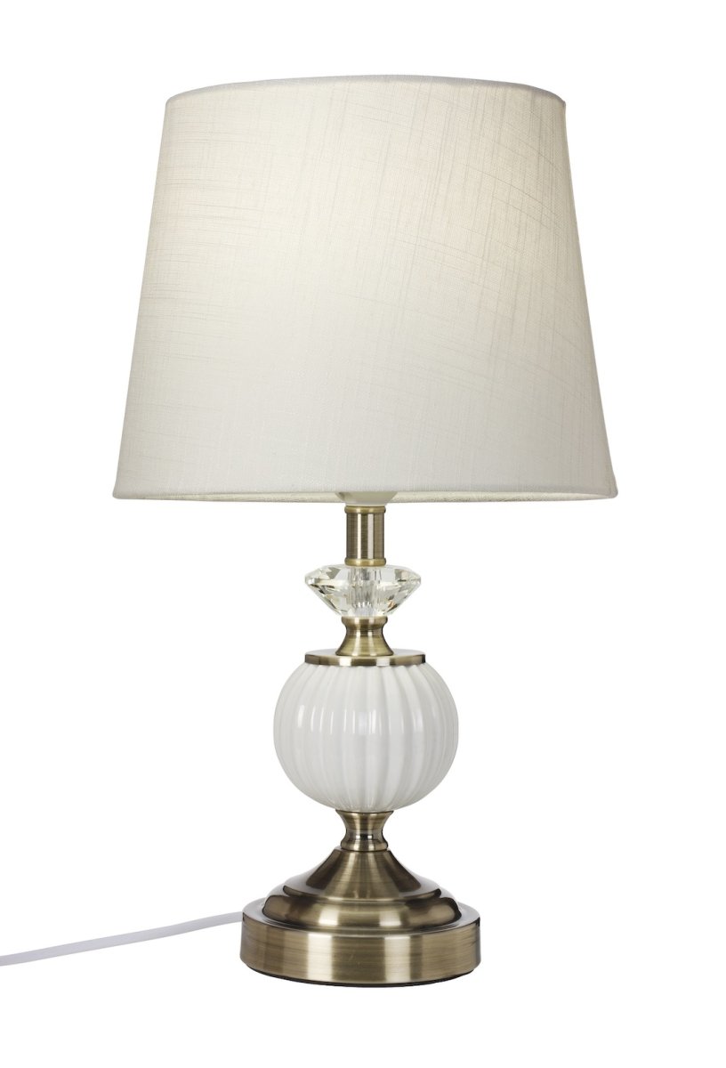 Siv 43cm Wit tafellamp Van Cottex - Deze lamp is gemaakt van wit keramiek en antiek messingkleurig metaal en straalt klassieke charme uit.