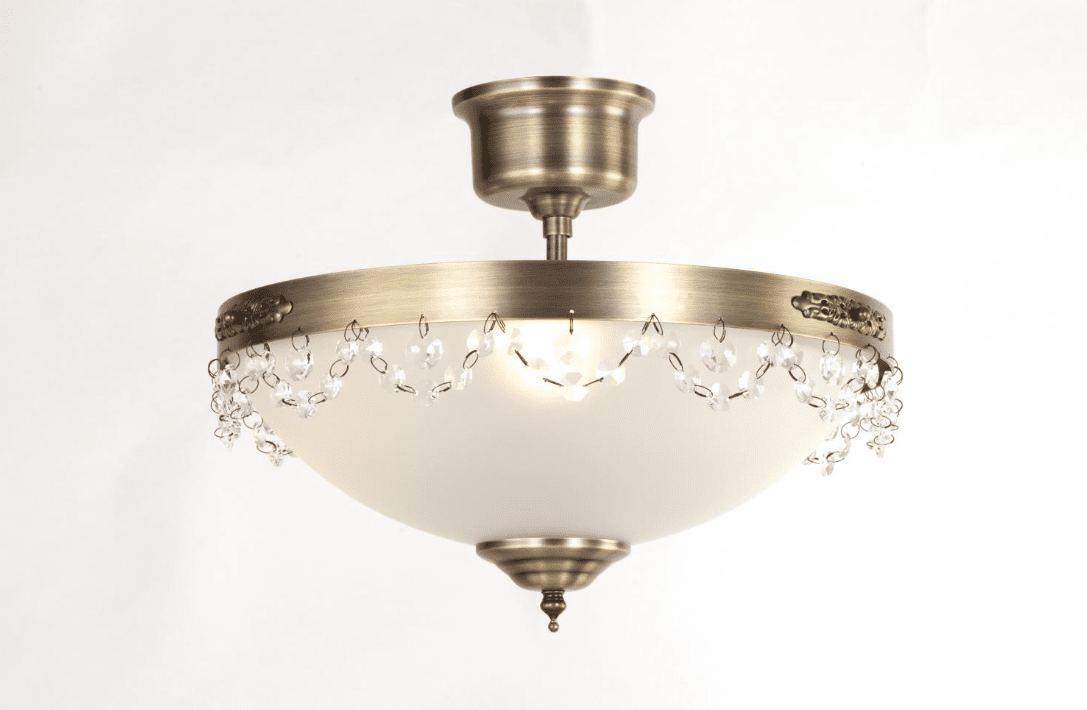 Fanny Ø36 Antiek messing plafondlamp Van Norrsken Design - De met de hand geslepen Klasse 1 K9-kristallen zorgen voor een verfijnde toets die de elegantie van de kamer vergroot.