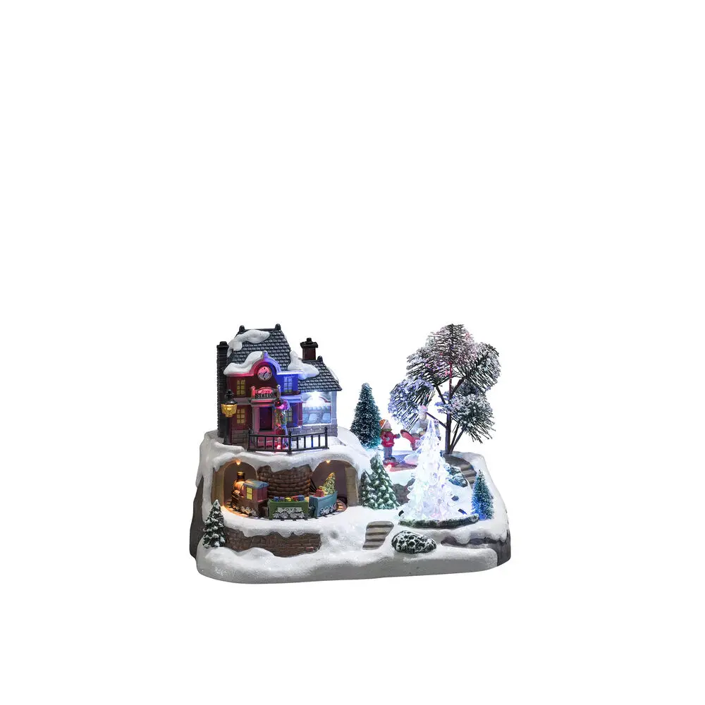 Mechanische Kerstdecoratie Met Treinstation 17cm Veelkleurig Van Konstsmide - Stap in een winterse miniatuurwereld met deze mechanische kerstversiering &ndash; een charmant treinstation in een besneeuwde omgeving.