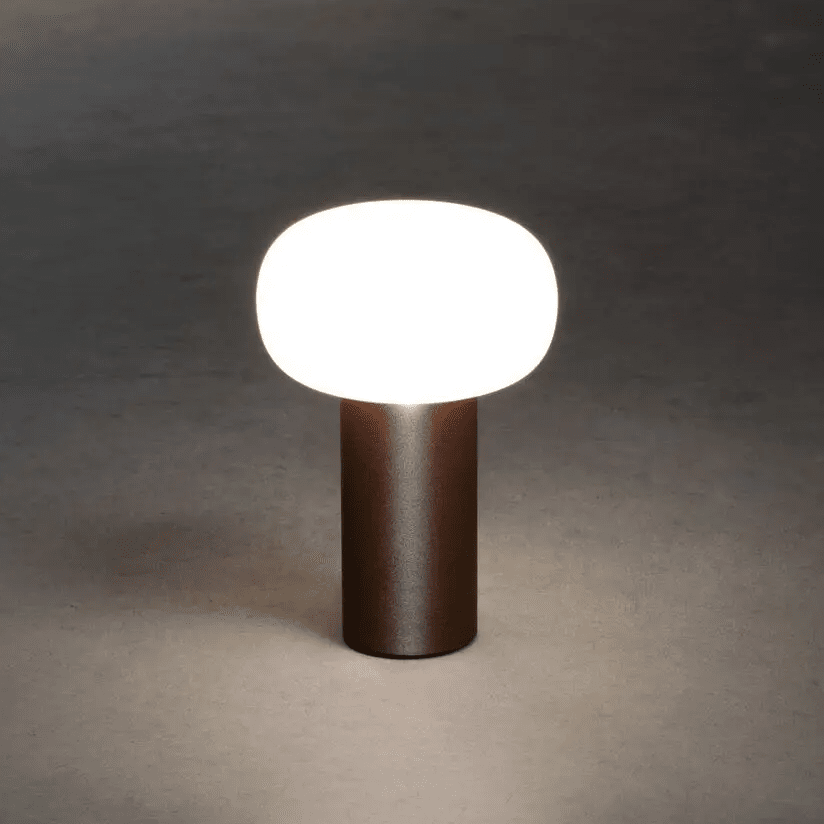 Antibes 20cm Roest Draagbare Van Konstsmide - De lamp heeft een dimmer waarmee u de helderheid en kleurtemperatuur kunt aanpassen.