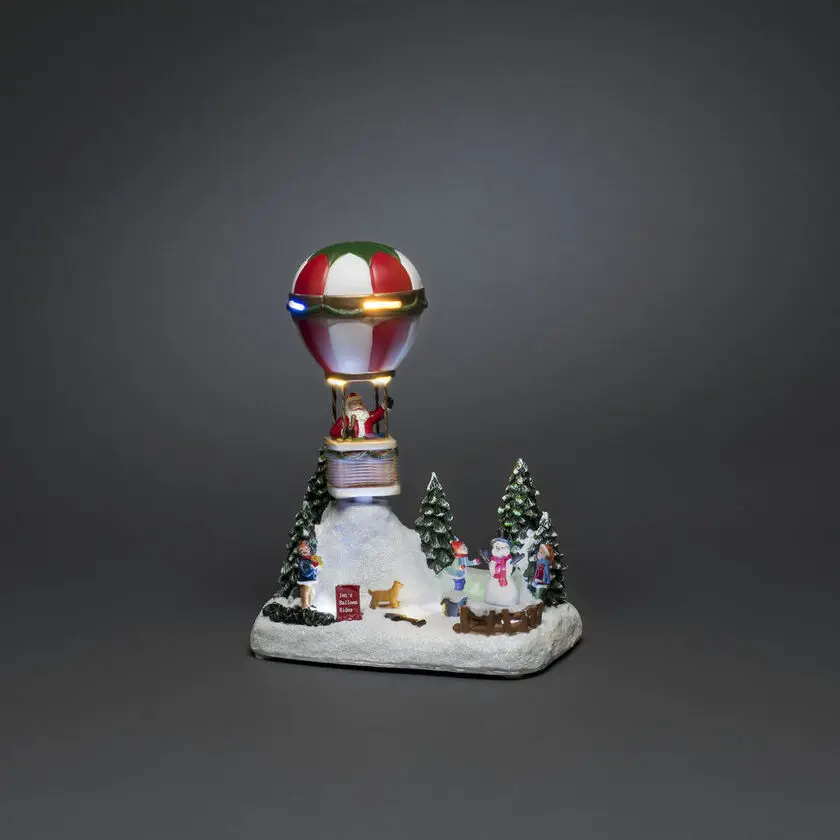 Mechanische Kerstdecoratie Met Luchtballon Veelkleurig Van Konstsmide - Laat de kerstsfeer opbloeien met deze fantasierijke mechanische kerstversiering - Een luchtballon met de Kerstman erop, die over een winterlandschap zweeft!