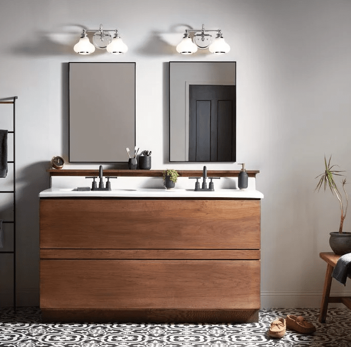Ainsley 40cm Gepolijst chroom badkamerlamp Van Elstead Lighting - De koepelvormige opalen glazen kappen zorgen voor een zacht en aangenaam licht en zijn gecombineerd met elegant gepolijst chroom dat de finishing touch geeft.