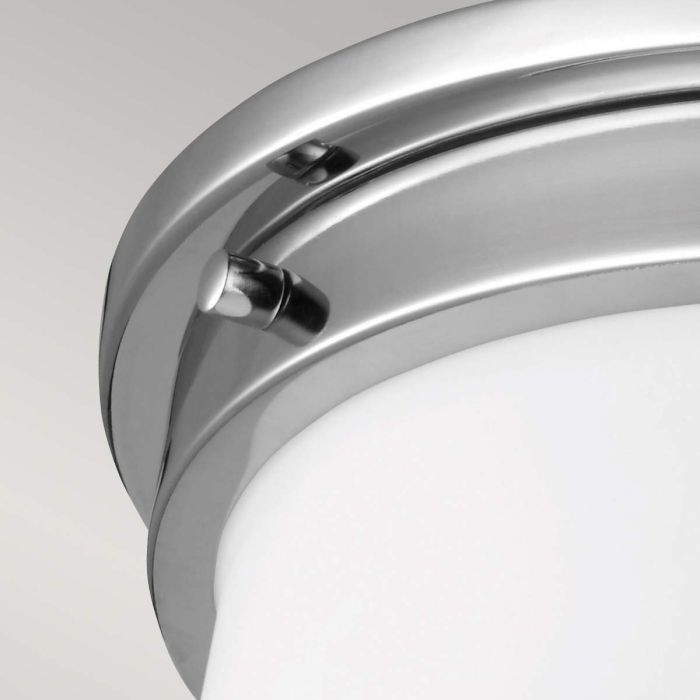 Payne Ø32 Chroom badkamerlamp Van Elstead Lighting - Gemaakt van staal en opaalglas, met details in een gepolijste chromen afwerking die een verfijnde en unieke uitstraling geven.