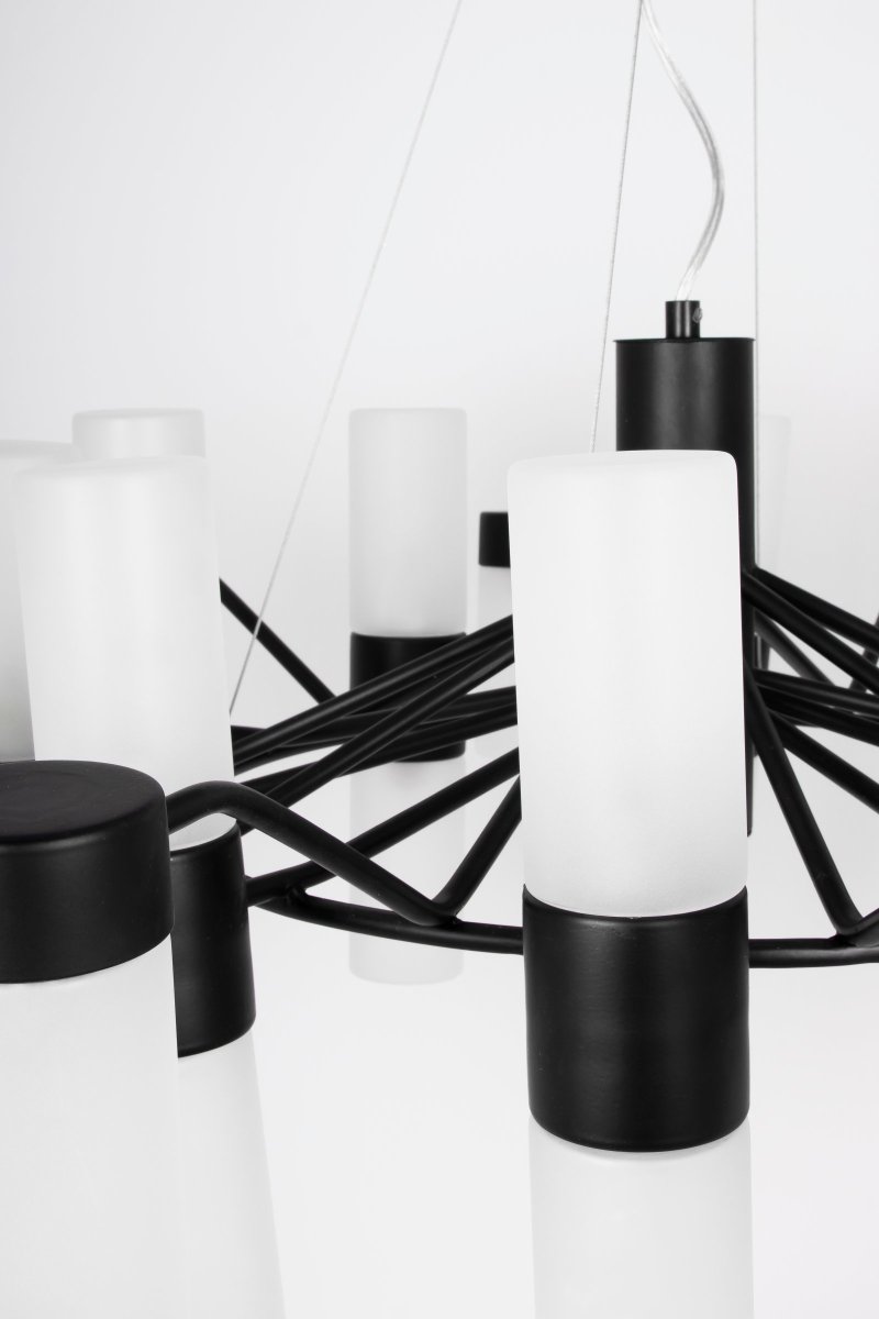 Santa Maria Ø90 Zwart hanglamp Van Globen Lighting - De lamp is gemaakt van matzwart gelakt metaal en heeft 30 koepels van gematteerd glas, waardoor er prachtige lichtpunten door het glas zichtbaar zijn wanneer de lamp brandt.