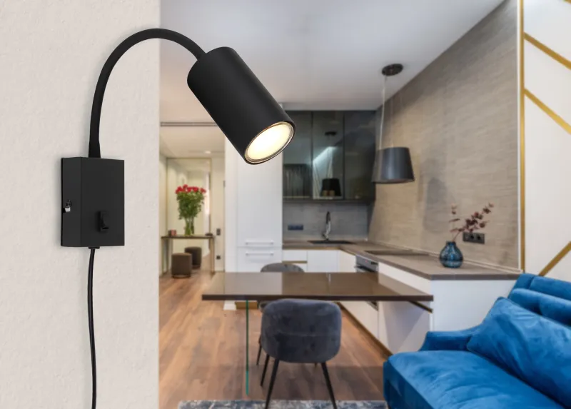 Robby Zwart leeslamp Van Globo Lighting - Robby &auml;r en klassisk, kompakt v&auml;gglampa tillverkad i plast och mattsvart metall, vilket ger en stilren och modern look.