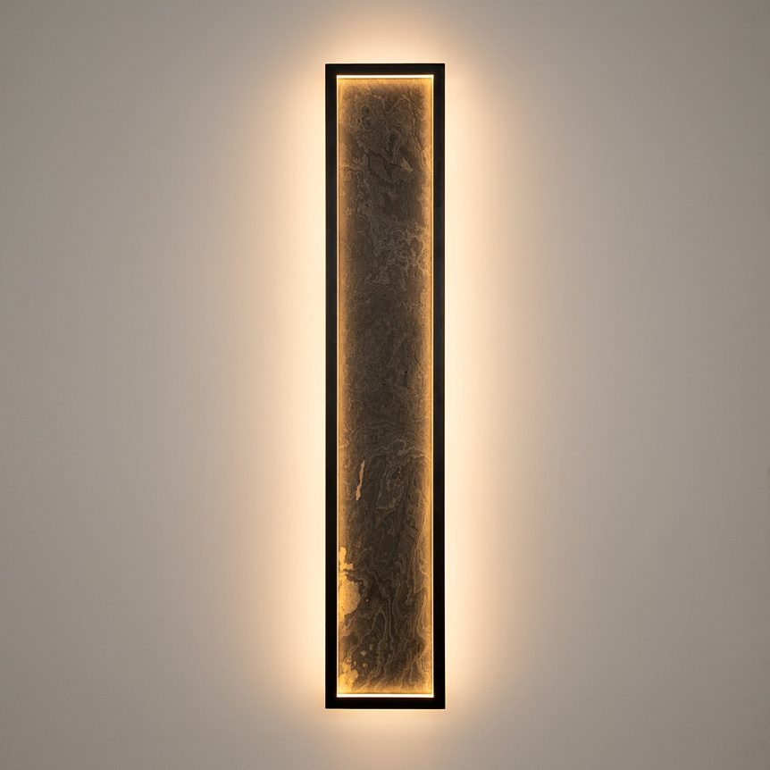 Orign 60cm Zwart wandlamp Van Maytoni - Orign is een metalen wandlamp met in het midden een elegante steenimitatie die een natuurlijke en exclusieve indruk geeft.