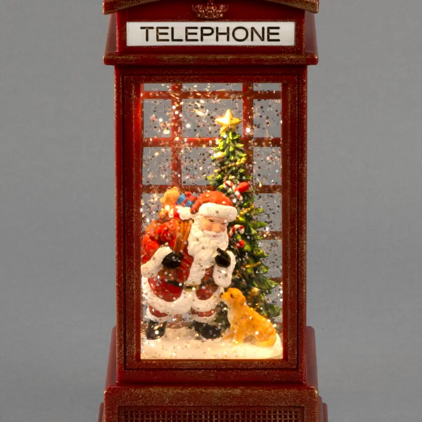 Met Water Gevulde Lantaarn Met telefooncel ROOD Van Konstsmide - Decoratieve mini-lantaarn gevuld met water in de vorm van een klassieke rode telefooncel met kerstmotief.