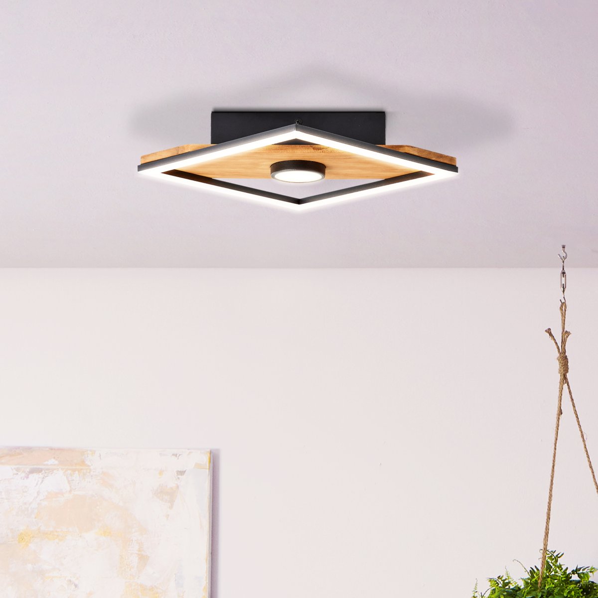 Woodbridge 25cm Hout plafondlamp Van Brilliant - De lamp combineert matzwart metaal met houten details, waardoor een huiselijke en natuurlijke sfeer ontstaat.