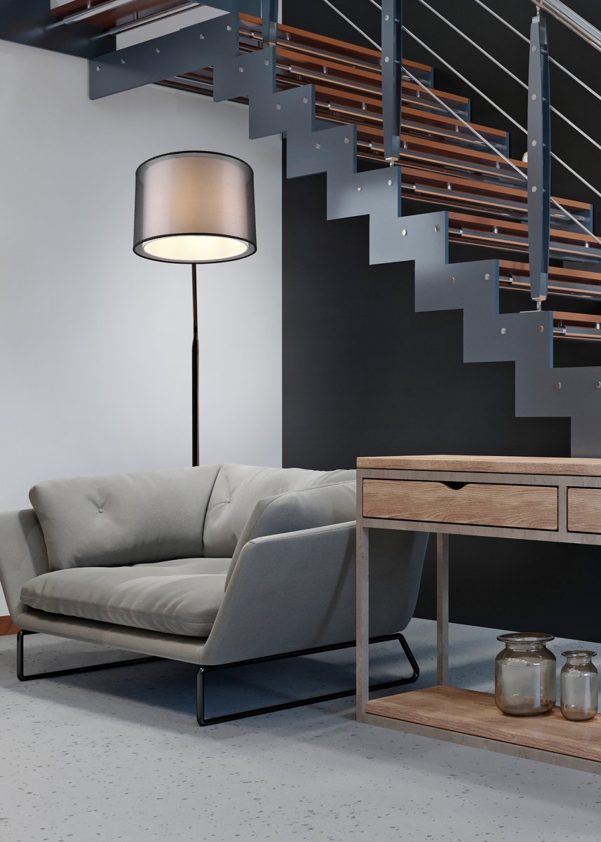 Burton Zwart vloerlamp Van Trio Lighting - De moderne combinatie van een witte stoffen binnenkap en een transparante zwarte kunststof buitenkap ziet er individueel en verfrissend uit en past perfect in een moderne levensstijl.