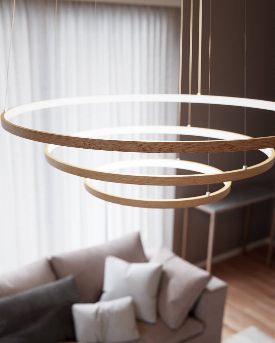 Trione Ø80 Hout hanglamp Van By Rydéns - Elke ring (met een diameter van 80 cm, 60 cm en 40 cm) kan eenvoudig in hoogte en positie worden versteld met de draadbeugel van de lamp.