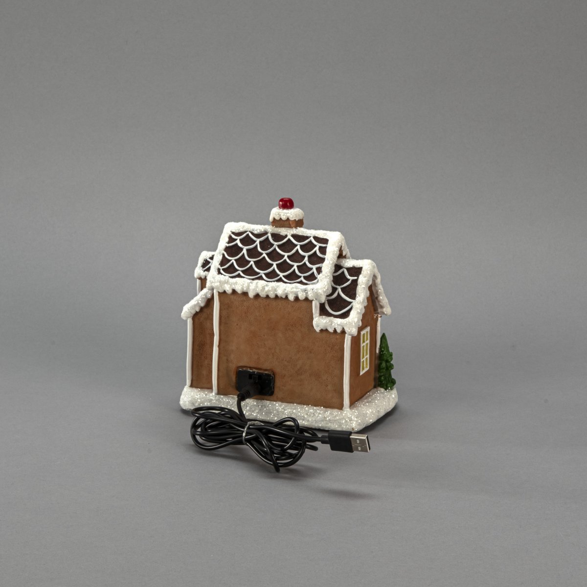 Peperkoekhuisje LED 17cm Bruin Van Konstsmide - Schattig peperkoekenhuisje met 9 LED-lampjes die de magie van Kerstmis verlichten met een warm wit licht.