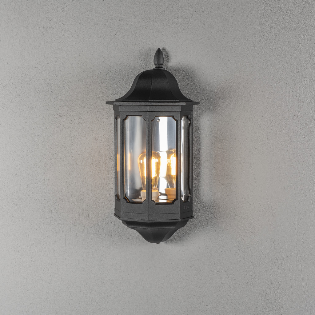 Pallas Zwart buitenlamp Van Konstsmide - De robuuste constructie van de lamp is ontworpen om alle weersomstandigheden te weerstaan, waardoor het een duurzame en betrouwbare keuze is voor uw buitenmuur.