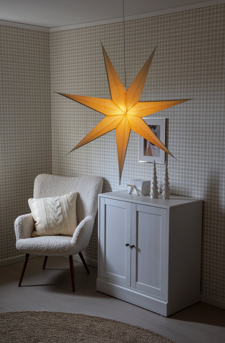 Papieren ster Ø78 Beige Van Konstsmide - Met zijn zeven punten en een royale diameter van 78 cm is het een prachtige blikvanger voor het raam of als hanglamp in de kamer.