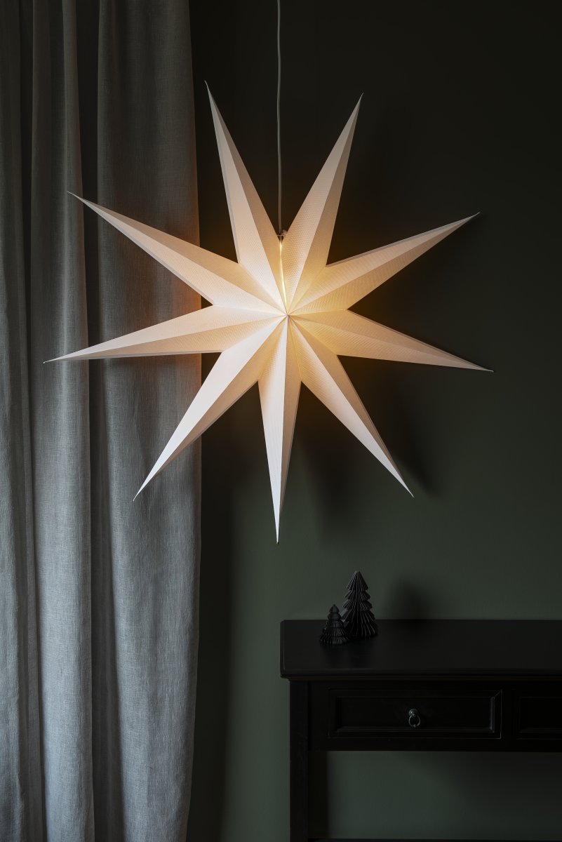 Papieren ster Ø115 Wit Van Konstsmide - Met zijn negen punten en een royale diameter van 115 cm is het een prachtige blikvanger voor het raam of als hanglamp in de kamer.