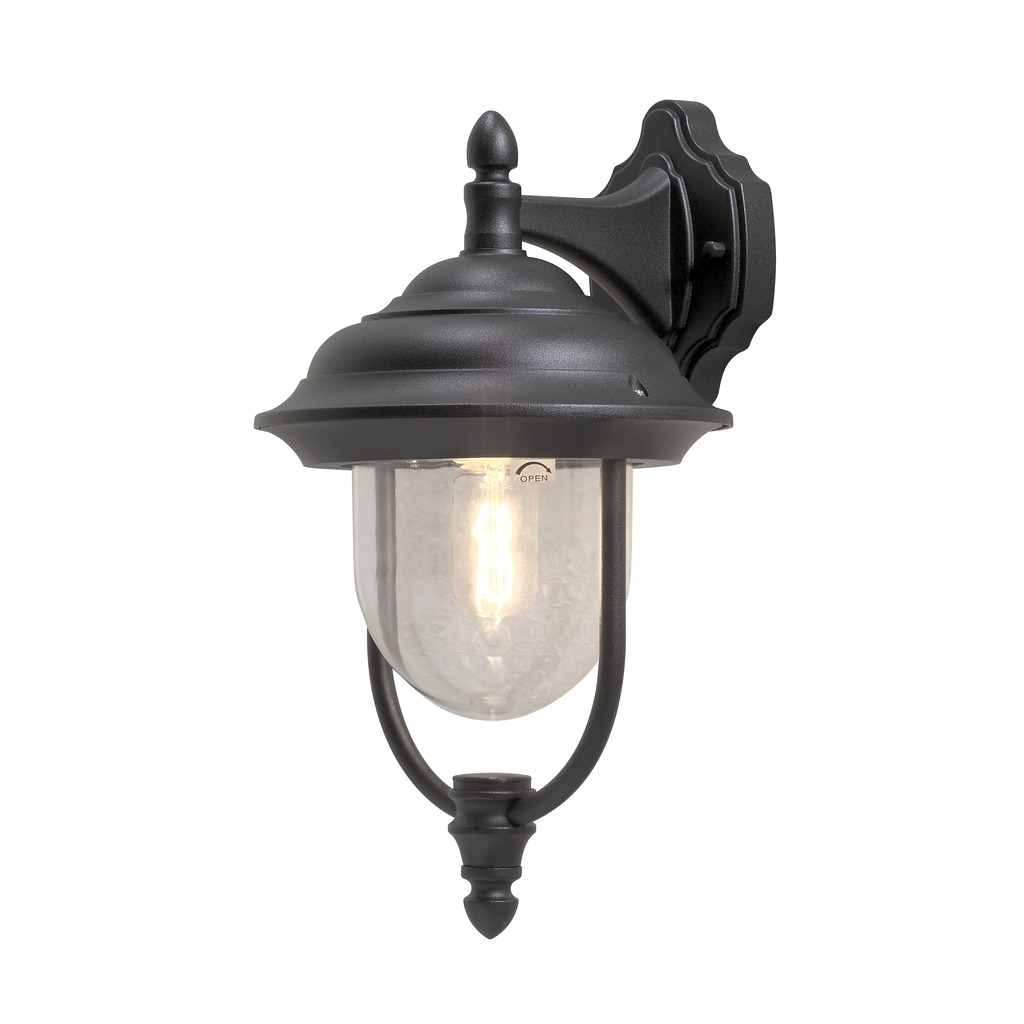 Parma Zwart buitenlamp Van Konstsmide - Dankzij de mooie vorm en de heldere glazen kap verspreidt de lamp een warm en uitnodigend licht, ideaal voor entrees en terrassen.