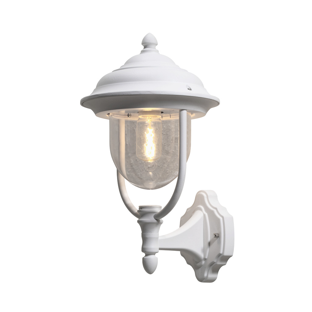 Parma Wit buitenlamp Van Konstsmide - Dankzij de mooie vorm en de heldere glazen kap verspreidt de lamp een warm en uitnodigend licht, ideaal voor entrees en terrassen.