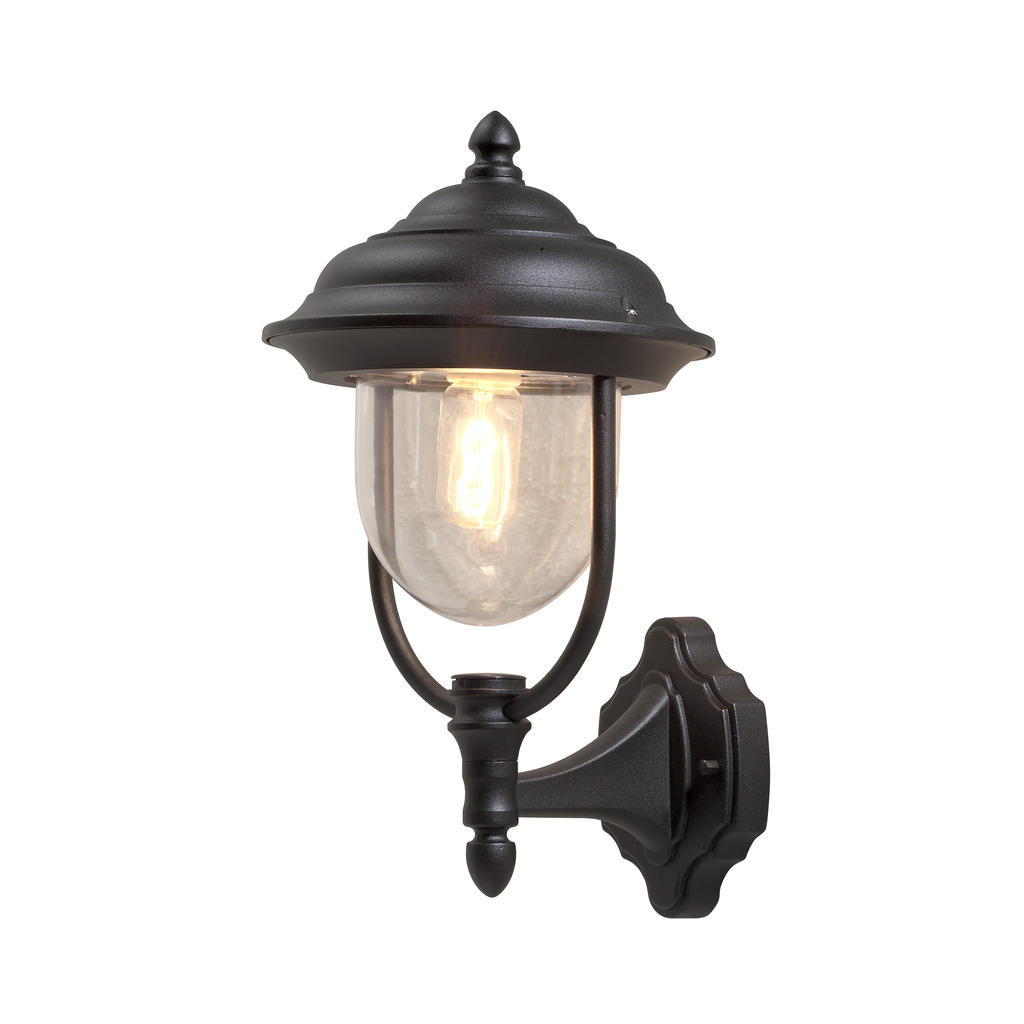 Parma Zwart buitenlamp Van Konstsmide - Dankzij de mooie vorm en de heldere glazen kap verspreidt de lamp een warm en uitnodigend licht, ideaal voor entrees en terrassen.