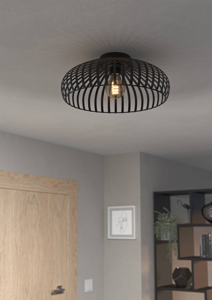 Mogano Ø43 Zwart plafondlamp Van Eglo - Wanneer de lamp brandt, creëert de zichtbare lichtbron een fascinerend schaduwspel, wat een extra dimensie aan de kamer toevoegt.
