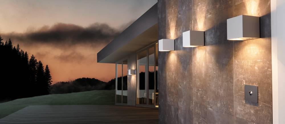 Calpino Wit buitenlamp Van Eglo - Deze wandlamp in een witte kubusvorm heeft een modern en minimalistisch design en past in elke kamer.