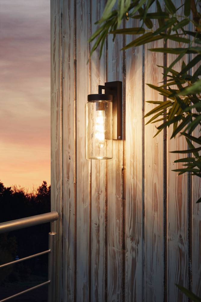 Bovolone Zwart buitenlamp Van Eglo - Met een zwart metalen frame en een cilindrische glazen kap accentueert het de zichtbare lichtbron op een stijlvolle manier.