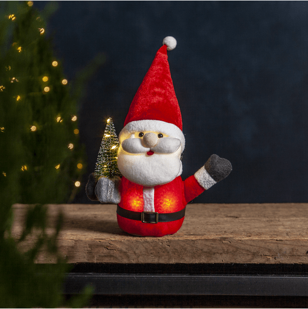 Joylight Kerstman ROOD Van Star Trading - Gezellige Kerstman met pakketje en kerstboom.