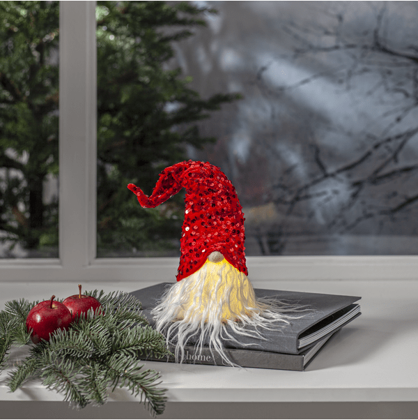 Joylight Kerstman ROOD Van Star Trading - Een op batterijen werkende, lichtgevende Kerstman met een glinsterende hoed.