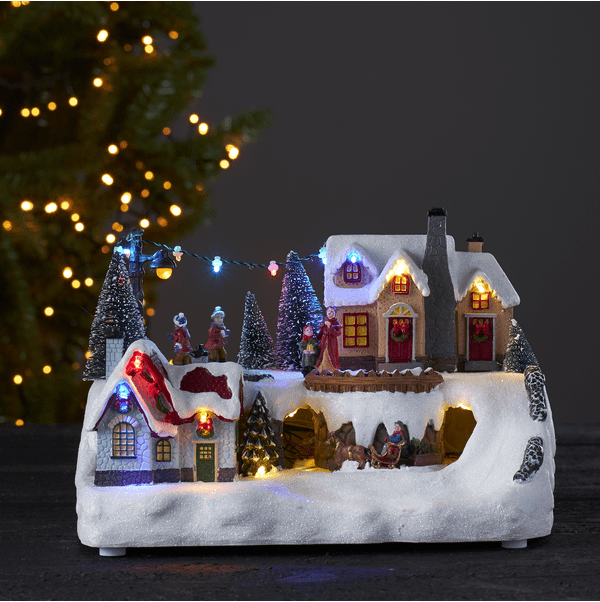 Iceville Veelkleurig Van Star Trading - Iceville biedt ook muziek met 8 verschillende kerstmelodie&euml;n met aan-/uitfunctie.