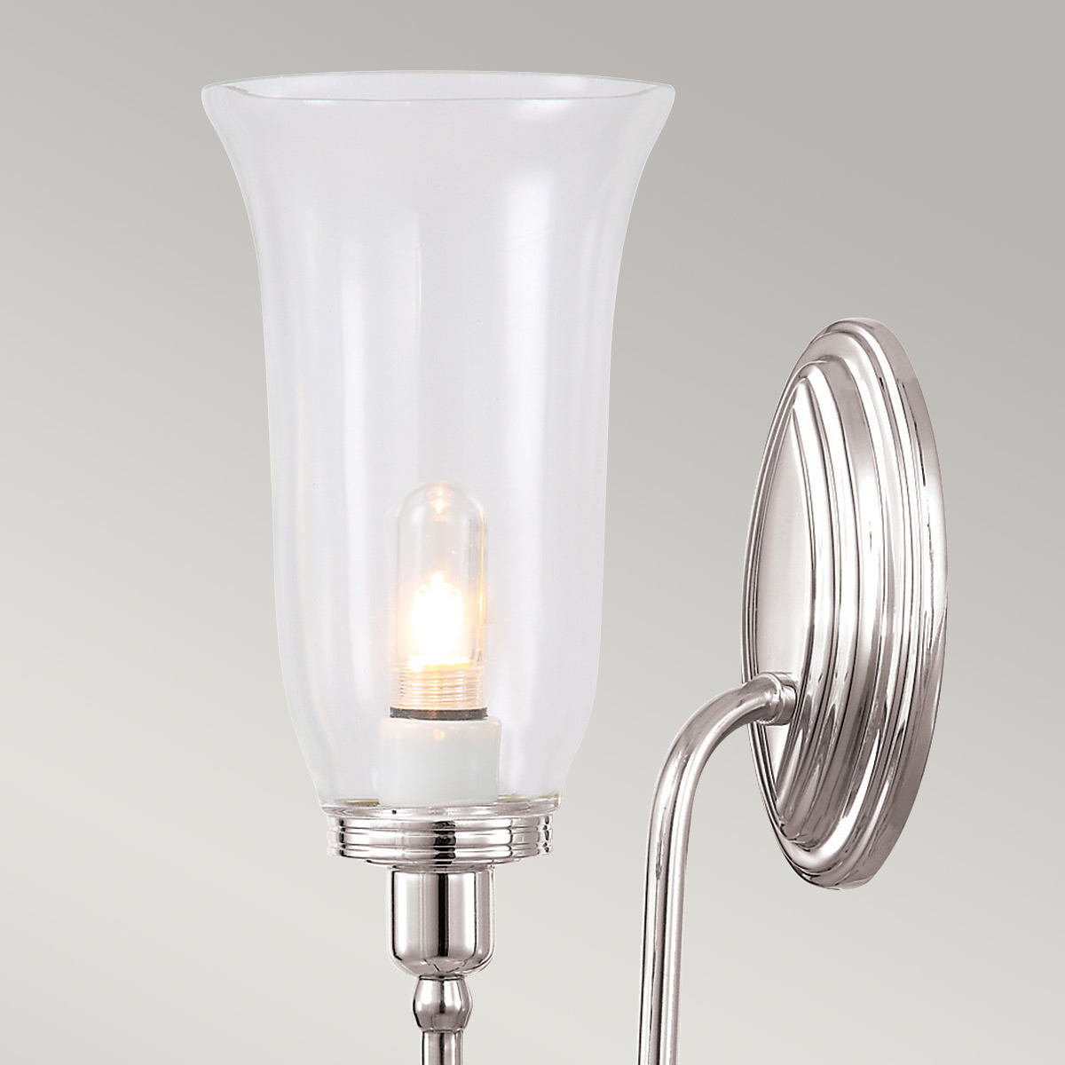 Blake 34cm Gepolijst nikkel badkamerlamp Van Elstead Lighting - De lamp is verkrijgbaar in verschillende stijlen en glasuitvoeringen en wordt aangeboden met oppervlakken in gepolijst chroom, gepolijst nikkel en gepolijst messing.