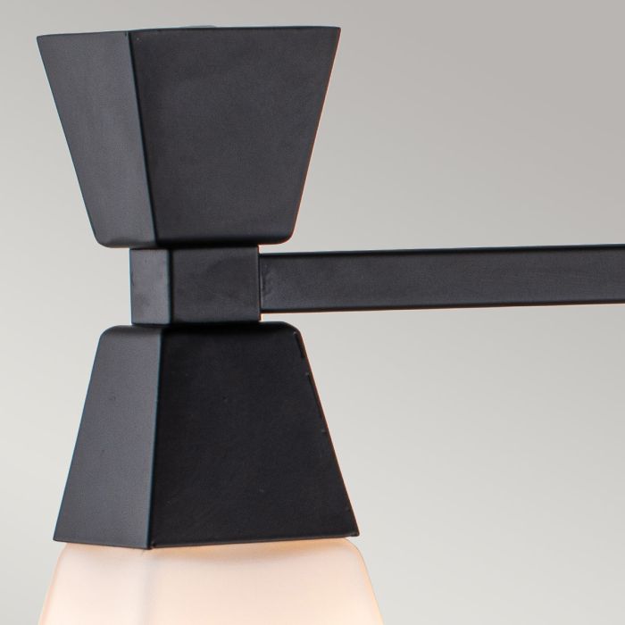 Bowtie 57cm Zwart badkamerlamp Van Elstead Lighting - De matzwarte wandlamp Bowtie is een moderne spiegellamp met een IP44-classificatie, waardoor deze geschikt is voor badkamers, maar ook voor andere interieurs, zoals wasruimtes of gastentoiletten.