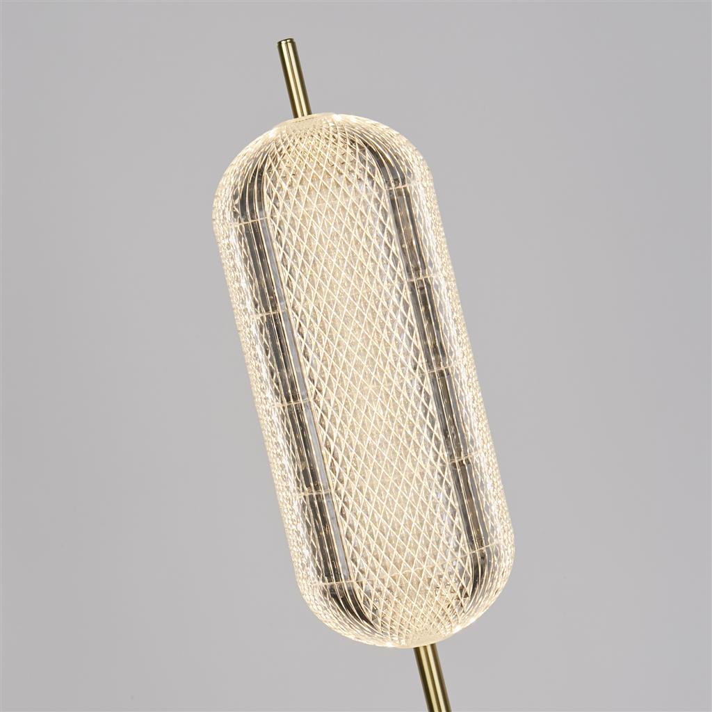 Capsule Messing vloerlamp Van Searchlight - Capsule is een elegante en moderne staande lamp met details van satijnmessing en een kap van acrylglas die een zacht en aangenaam licht verspreidt.