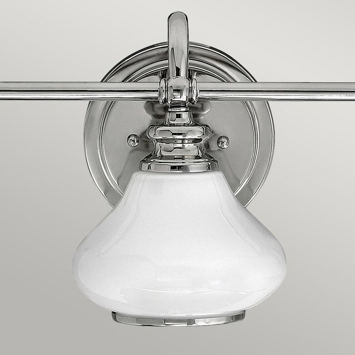 Ainsley 60cm Gepolijst chroom badkamerlamp Van Elstead Lighting - De koepelvormige opalen glazen kappen zorgen voor een zacht en aangenaam licht en zijn gecombineerd met elegant gepolijst chroom dat de finishing touch geeft.